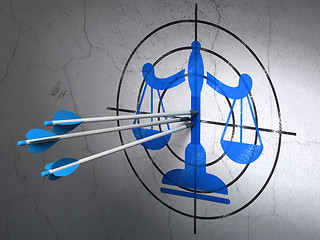 Image showing Law concept: arrows in Scales target on wall background