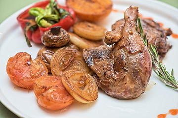 Image showing grilled duck legs