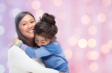 Image showing happy mother and daughter hugging