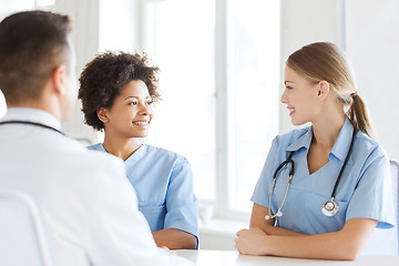 Image showing group of happy doctors meeting at hospital office