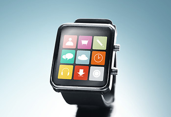 Image showing close up of black smart watch with app icons