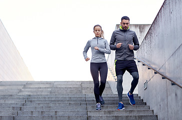 Image showing couple walking downstairs on stadium