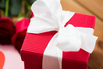 Image showing close up of red gift box with white bow