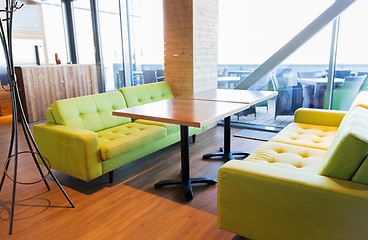 Image showing restaurant interior with table and sofas