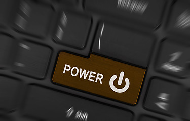 Image showing Brown power button on a black laptop keyboard