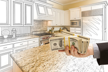 Image showing Hand Handing Cash Over Kitchen Design Drawing and Photo Combinat