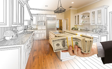 Image showing Hand Handing Cash Over Kitchen Design Drawing and Photo Combinat