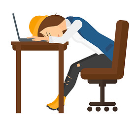 Image showing Woman sleeping on workplace.