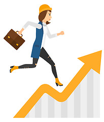 Image showing Woman running on growth graph. 