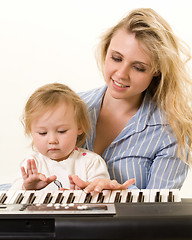 Image showing Learning to play keyboard