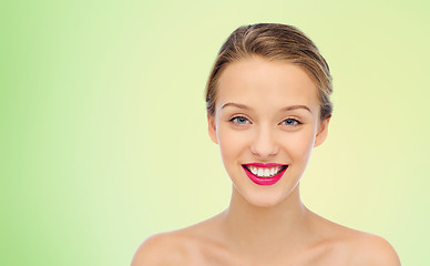 Image showing smiling young woman face and shoulders