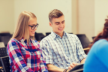 Image showing group of smiling students with tablet pc