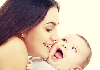 Image showing mother kissing her baby