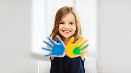 Image showing girl showing painted hands