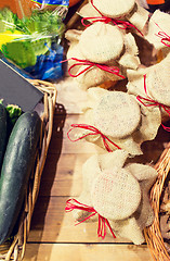 Image showing honey decorated jars and vegetables at food market