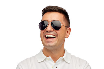 Image showing face of smiling man in polo t-shirt and sunglasses