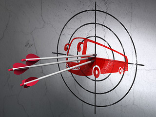 Image showing Travel concept: arrows in Bus target on wall background