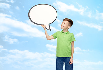 Image showing happy boy holding blank white text bubble banner