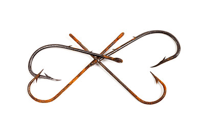 Image showing Old rusty fish hooks in form of hearts