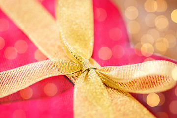 Image showing close up of red heart shaped gift box with bow