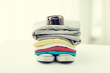 Image showing close up of clothes and accessories on table