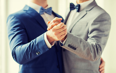 Image showing close up of happy male gay couple dancing