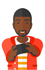 Image showing Man playing video game.