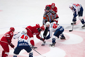 Image showing A. Potapov (89) and R. Horak (15) on face-off