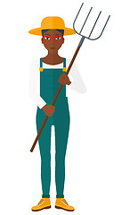 Image showing Farmer with pitchfork.