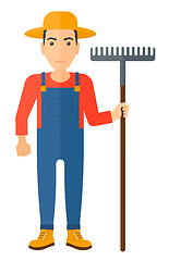 Image showing Farmer with rake.