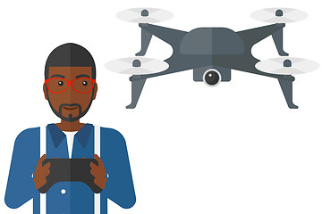 Image showing Man flying drone.