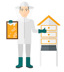 Image showing Bee-keeper at apiary.