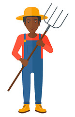 Image showing Farmer with pitchfork.