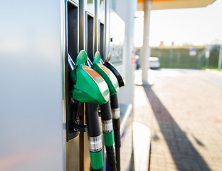 Image showing close up of gasoline hose at gas station