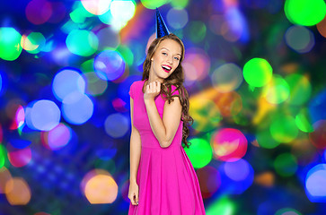 Image showing happy young woman or teen girl in party cap