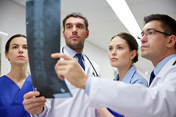 Image showing group of doctors looking at x-ray scan image