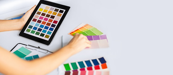 Image showing woman working with color samples for selection