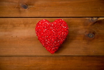 Image showing close up of red heart decoration on wood