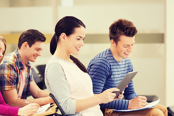 Image showing group of smiling students with tablet pc