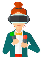 Image showing Woman wearing virtual reality headset.