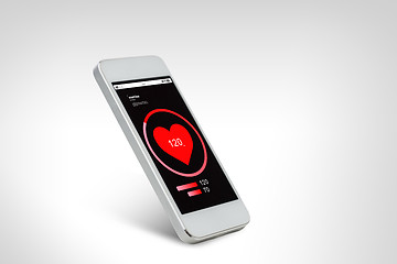 Image showing white smarthphone with red heart icon screen