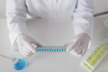 Image showing close up of scientist making test in lab