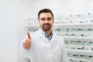 Image showing man with glasses and thumbs up at optics store