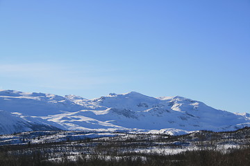 Image showing snow covered mountains in Valdres