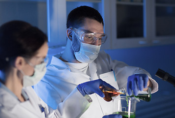 Image showing close up of scientists making test in lab