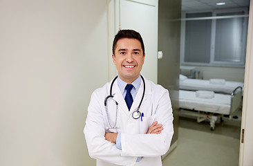 Image showing smiling doctor with stethoscope at hospital 