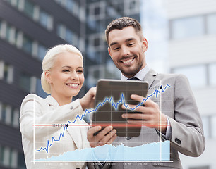 Image showing smiling businessmen with tablet pc outdoors