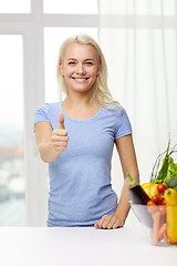 Image showing happy woman with vegetables showing thumbs up