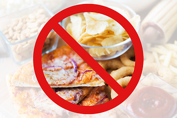 Image showing close up of fast food snacks behind no symbol