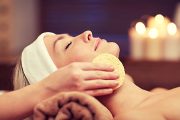 Image showing close up of woman having face cleaning in spa